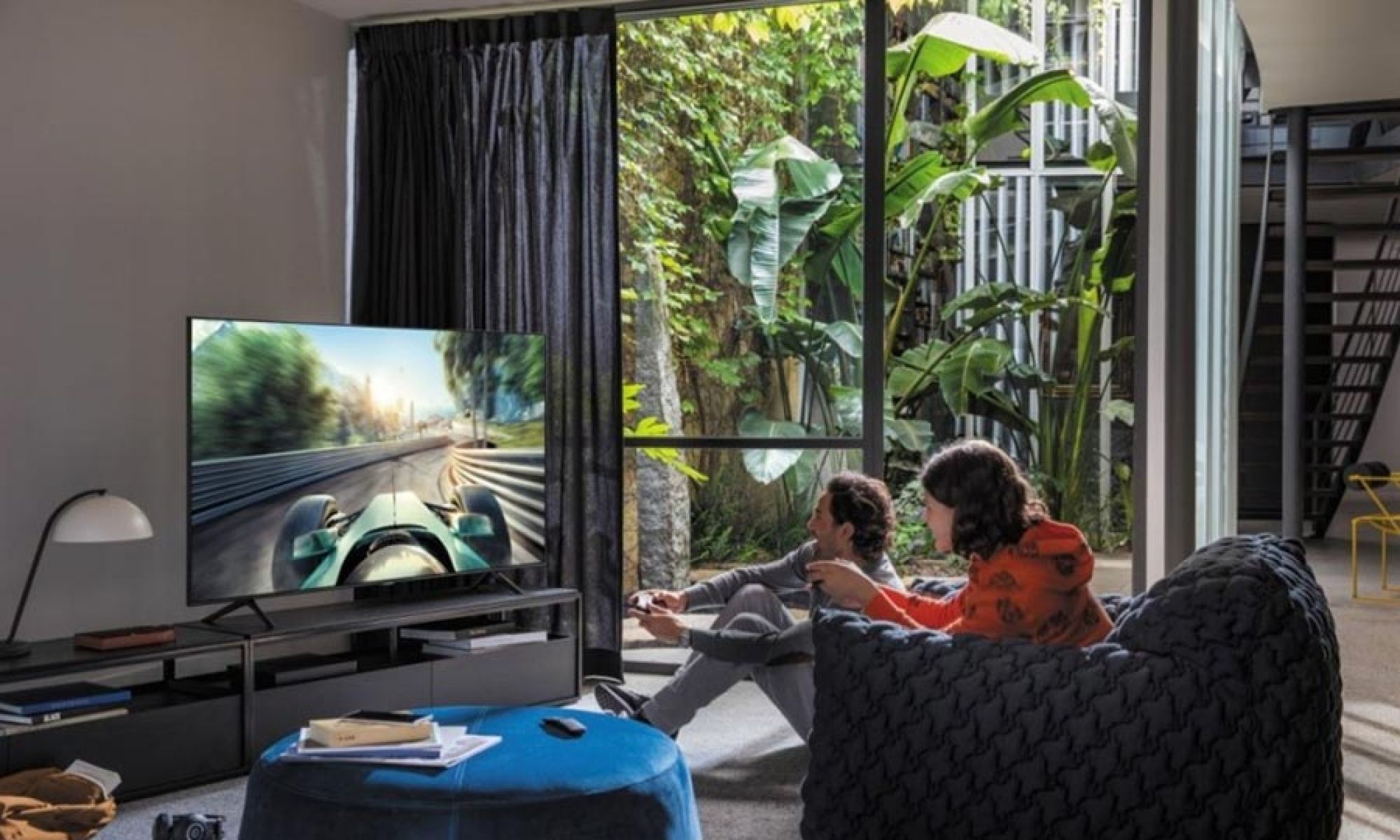 Couple watching television in a contemporary living room