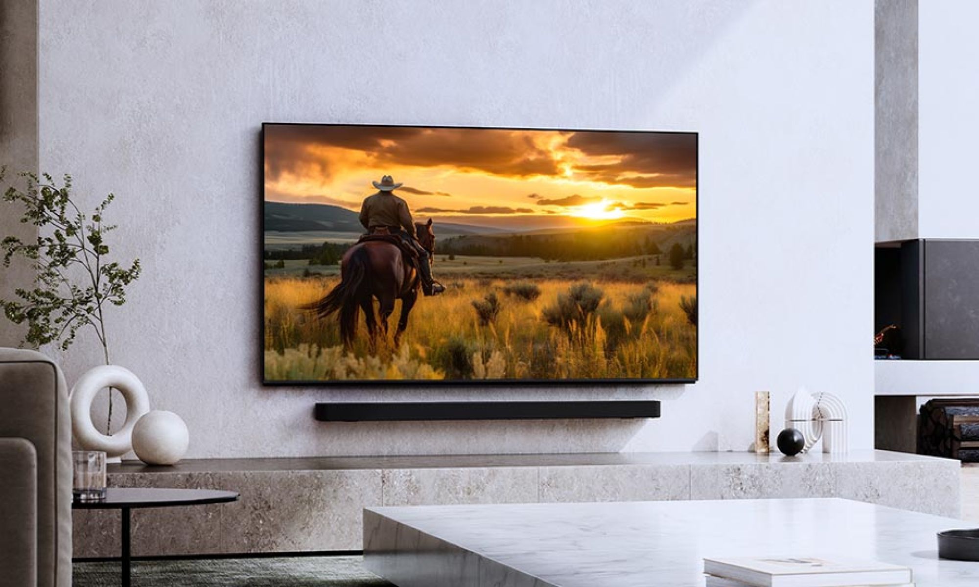 Wall mounted television with slim soundbar in a modern living room